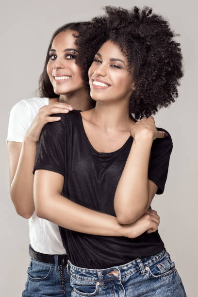 istock Smiling beautiful african american girls. 693064376