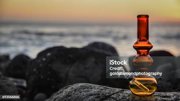 Right Side Red Ocean Bong Stock Photo - Download Image Now - Bong, Red, Beach