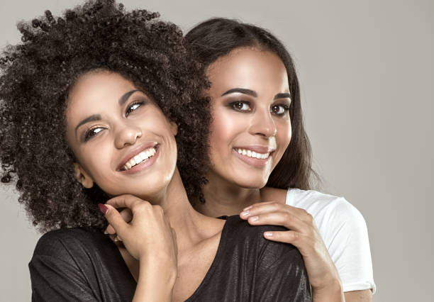 istock Smiling beautiful african american girls. 693067140