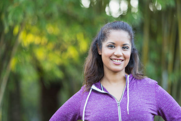 African-American and Hispanic woman smiling