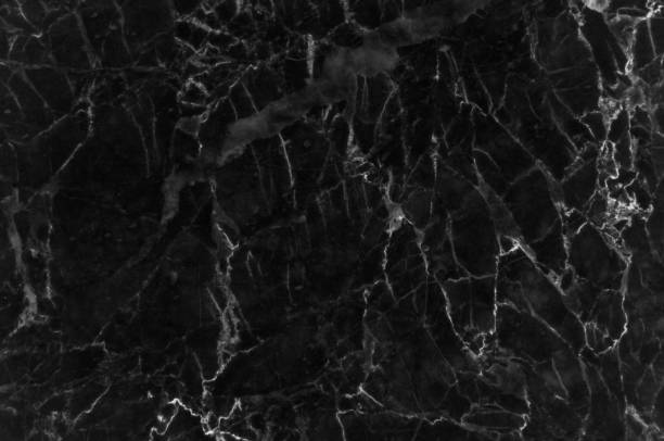 istock Black marble texture with lots of contrasting veining 693082004