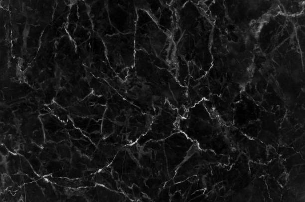 istock Black marble texture with lots of contrasting veining 693082050