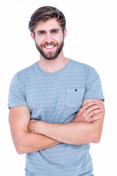 istock Happy handsome man looking at camera with arms crossed 693085478