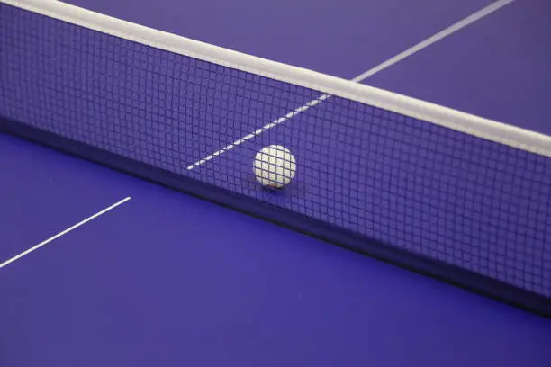 Photo of Ping pong table and ball