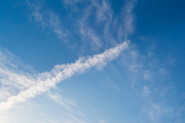 istock Unusual Cloud Formation: Cumulus or Chemtrail? 693088596