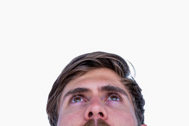 istock Close up view of man looking up 693091236