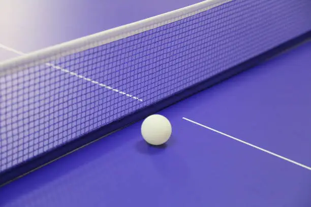 Photo of Ping pong table and ball