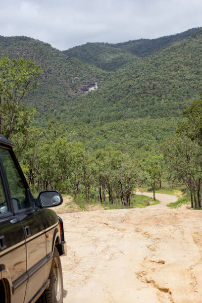 istock Car on dirt road to Emerald Creek Falls 693094582