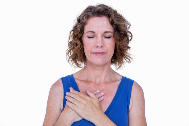 istock Pretty brunette with her hands on heart 693100590