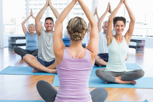 istock Sporty people with joined hands over heads 693103520