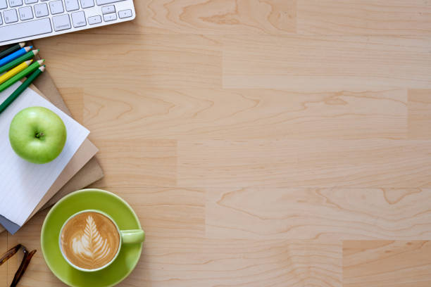 istock Desktop with business objects and snack foods. 693106242