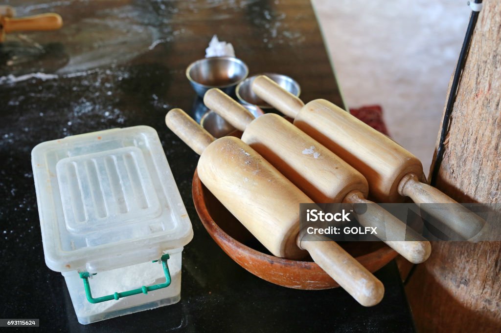 Wooden rolling pin tools. Archival Stock Photo