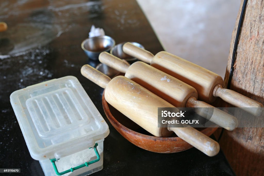 Wooden rolling pin tools. Archival Stock Photo
