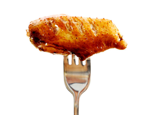 Roast chicken wings on a white background
