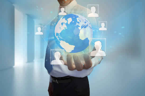istock Businessman presenting earth with profile pictures 693119062