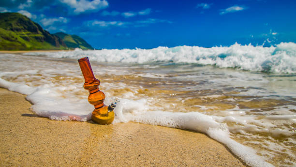 Waves crashing into bong on the sand Bong on the sand at the beach bong photos stock pictures, royalty-free photos & images