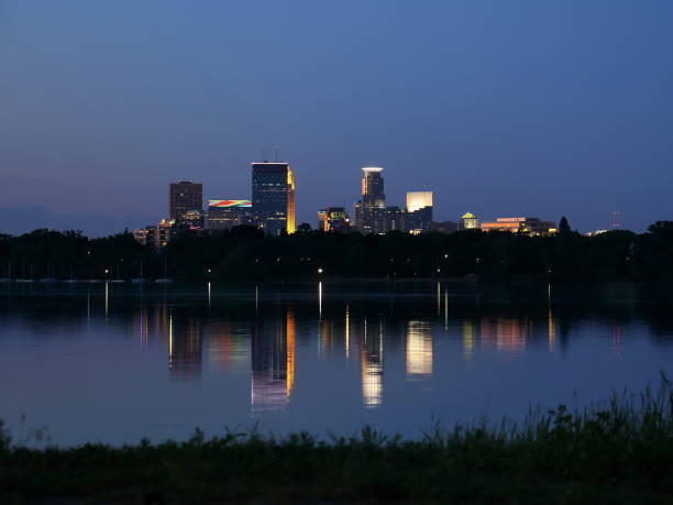 istock Minneapolis Skyline Reflecting in Lake Calhoun 693125182