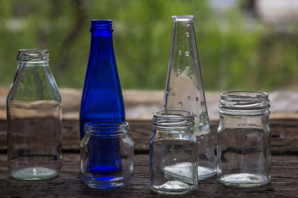 istock Empty jars and bottles on the wooden window sill 693129544