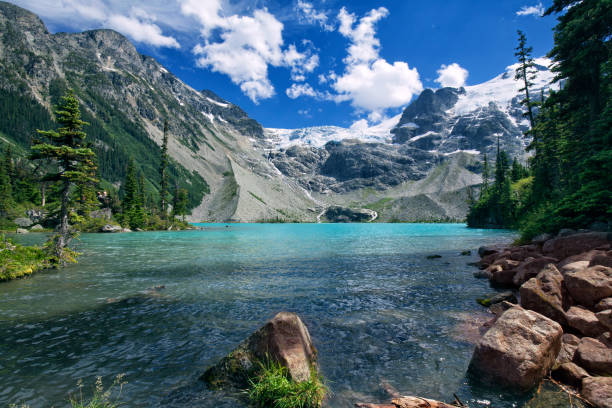 Joffre Lakes in summer, BC, Canada Upper Joffre Lake in summer in Pemberton, BC, Canada vancouver stock pictures, royalty-free photos & images