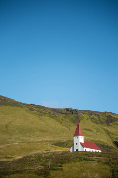 istock Church on the hill at Vik, Iceland 693139024