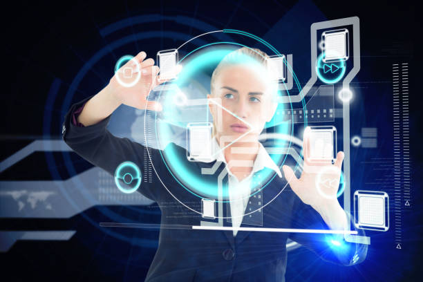 istock Blonde businesswoman touching interface 693145874