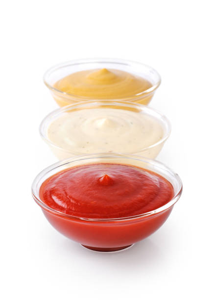 istock Bowls with ketchup mustard and mayonnaise isolated on white background. 693146208