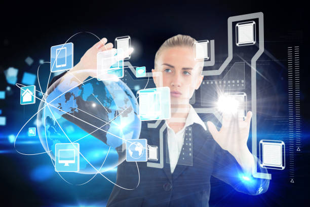 istock Blonde businesswoman touching interface 693146328