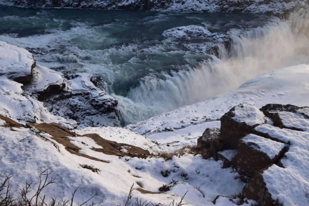 istock Gullfoss falls spray droplets reflecting the sunshine 693156486