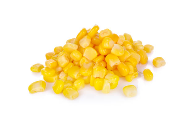 istock pile of boiled sweet corn seeds on white background 693164714