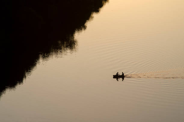 istock Fishing by boat at sunset 693165042