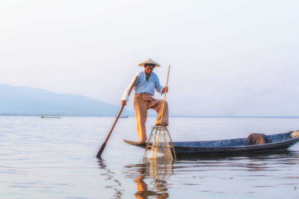 istock Fisherman at Inle Lake, Myanmar. 693170146