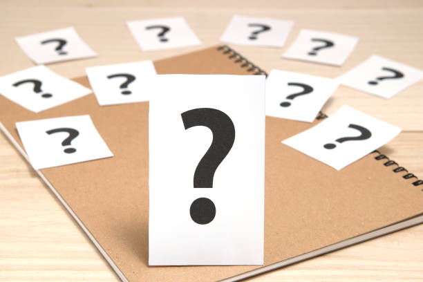 istock Big question mark on a piece of paper. 693177428