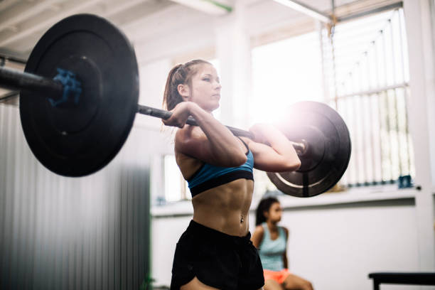 istock Olympic lift done by strong woman 693186772