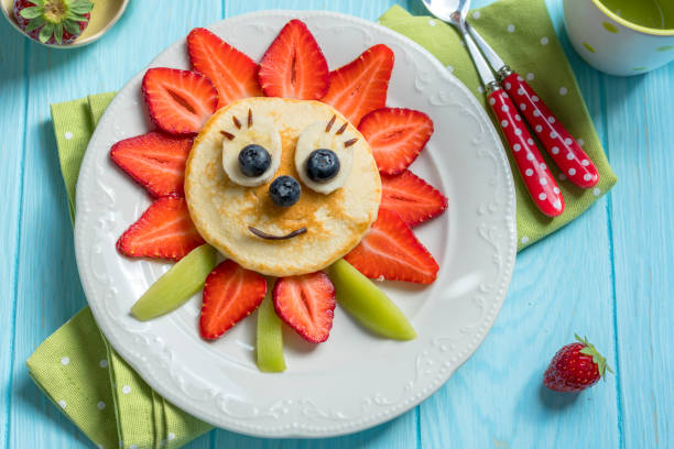 istock Pancakes with berries for kids 693191266