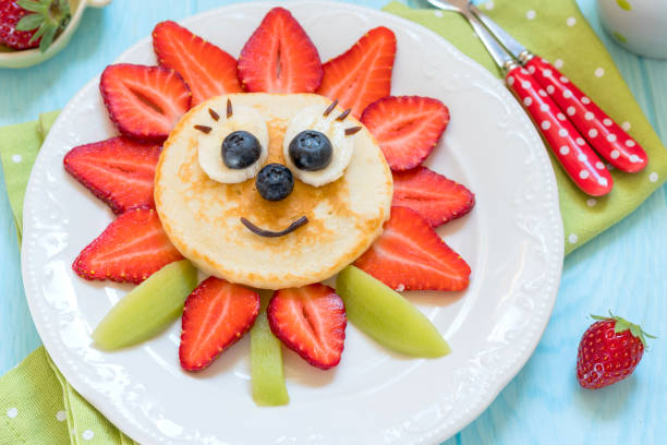 istock Pancakes with berries for kids 693191324