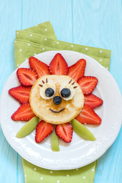 istock Pancakes with berries for kids 693191356