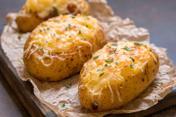 istock Baked stuffed potatoes with cheese and bacon 693192352