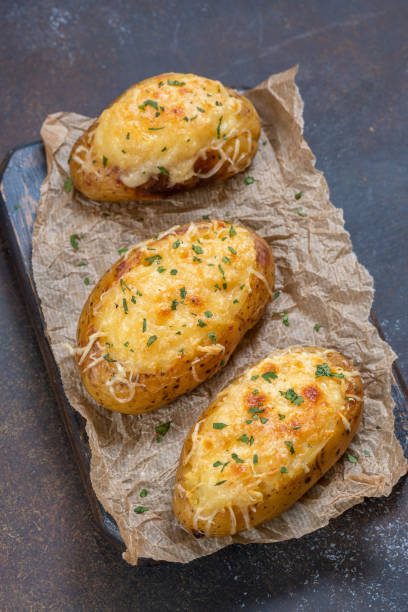 istock Baked stuffed potatoes with cheese and bacon 693192388