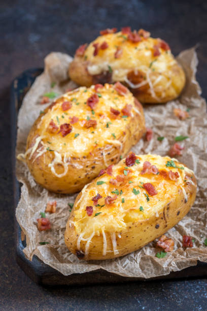 istock Baked stuffed potatoes with cheese and bacon 693192506