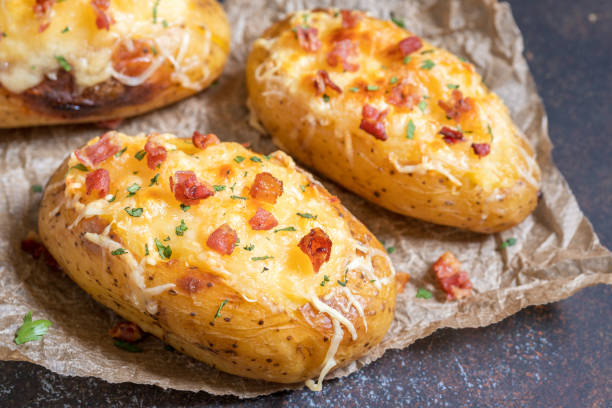 istock Baked stuffed potatoes with cheese and bacon 693192652