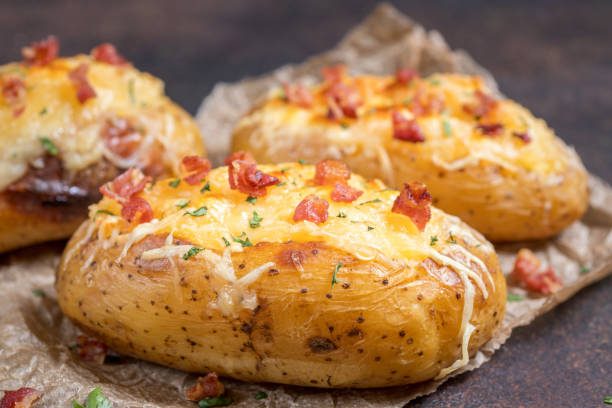 istock Baked stuffed potatoes with cheese and bacon 693192926