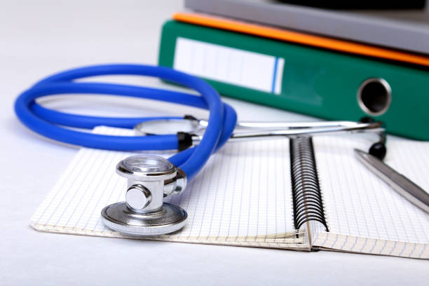 istock Folder file, stethoscope and RX prescription on the desk. blurred background. 693196126