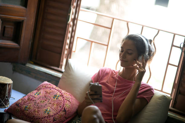 istock Listening to music. 693200832
