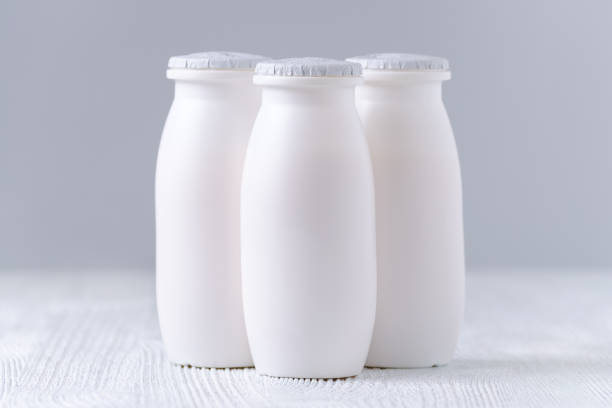 istock drink yogurt in plastic bottles on gray background 693208202