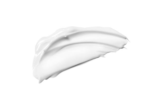 fotografii de stoc, fotografii și imagini scutite de redevențe cu cremă cosmetică izolată pe alb - smântână