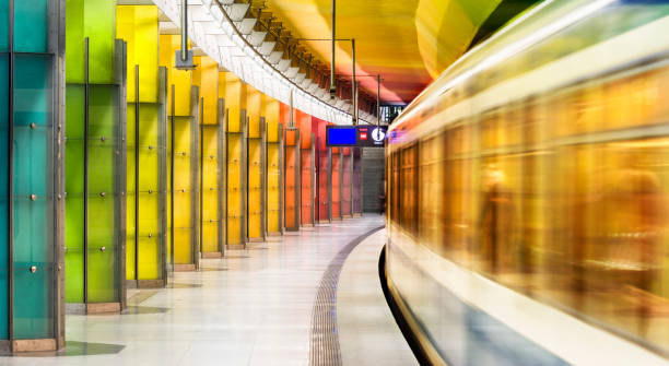 colourful subway station in munich germany - blurred motion city life train europe imagens e fotografias de stock