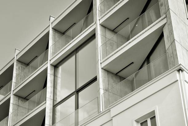 istock Modern, Luxury Apartment Building. Black and white 693244868