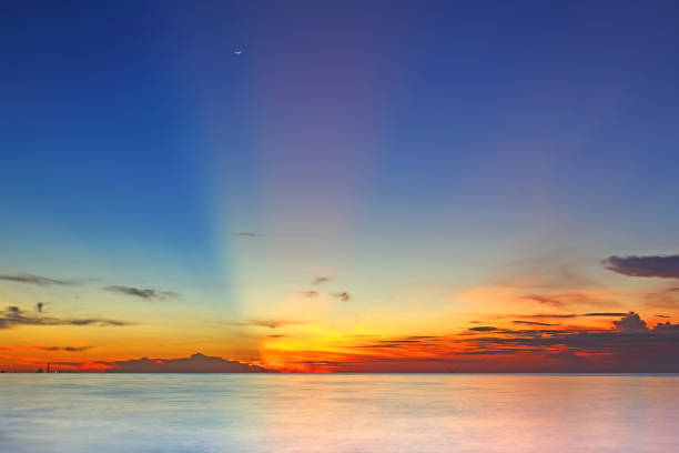 istock Sunrise over sea background 693245202