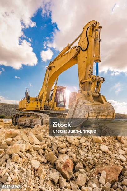 Outdoor Quarry With Heavy Machinery Stock Photo - Download Image Now - Backhoe, Machinery, Construction Industry