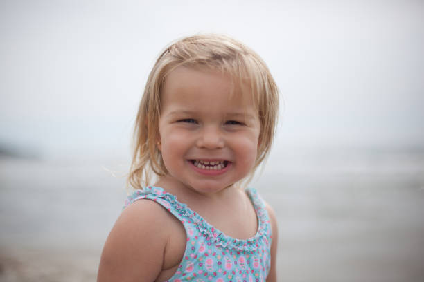 istock girl at the beach 693253236